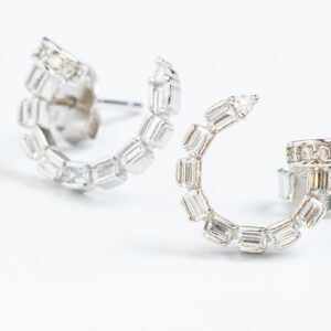 Silver Hoop StudsMini silver hoops with square clear zirons detail.