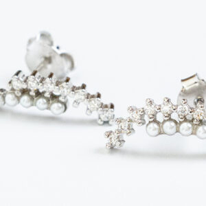 Silver Crown StudsTiny regal crowns with embedded crystals.