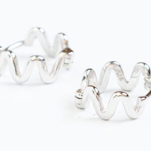 Silver Zig-Zag small hoopsModern silver version of the zig-zag design.